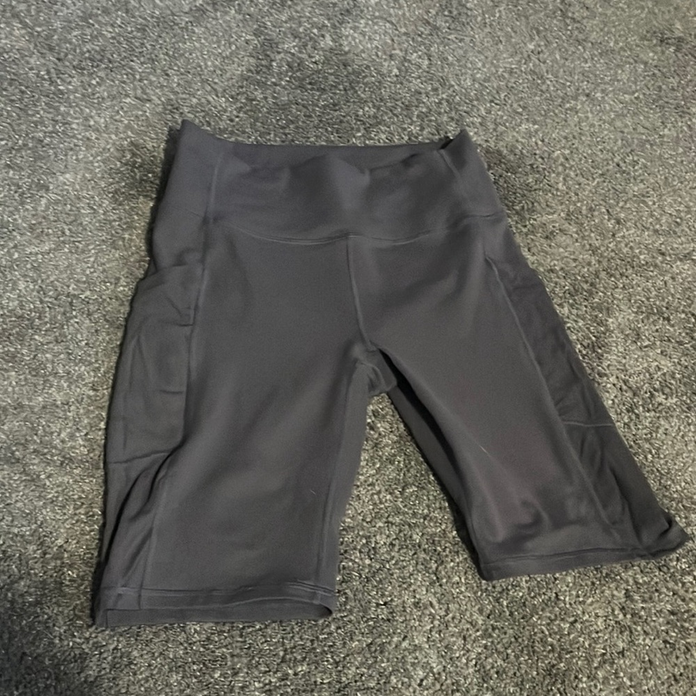 Fabletics biker shorts, never worn, dusty Purple, small but fit medium.